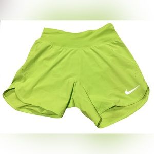 Nike women’s Eclipse 5” Running Shorts color Volt, size XS